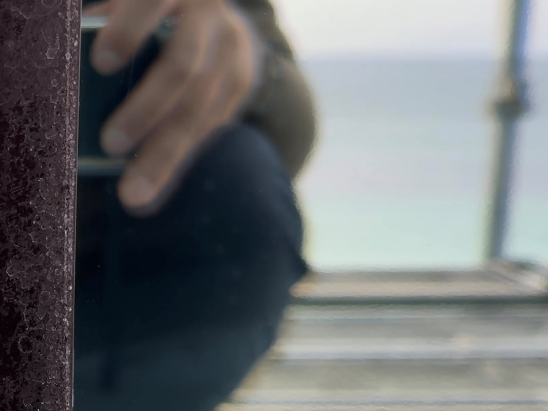 白く曇った塩害のガラスの研磨後